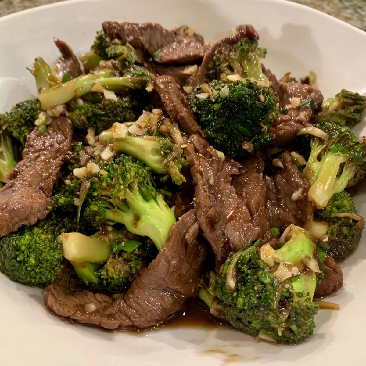 Sizzling Easy Beef and Broccoli Stir-Fry in a savory garlic-ginger sauce, perfect for dinner.