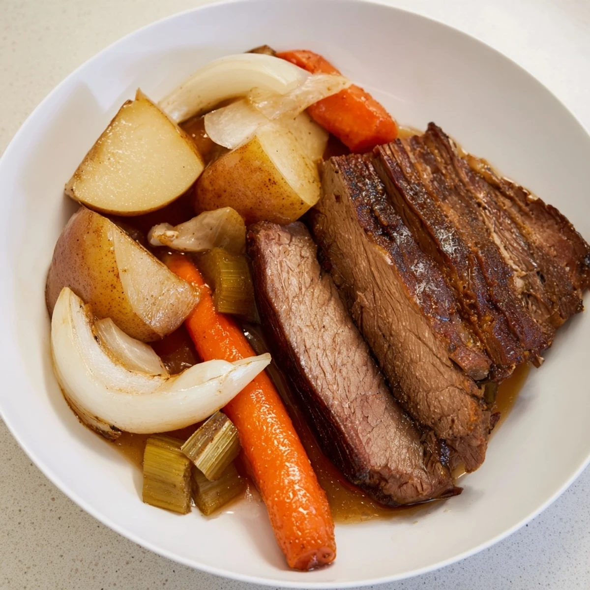 Hearty Sunday Pot Roast, showcasing a fork-tender beef roast with savory, rich gravy.