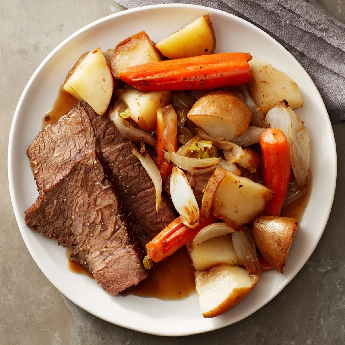 A close-up of a steaming Sunday Pot Roast, filled with colorful, flavorful roasted root vegetables.