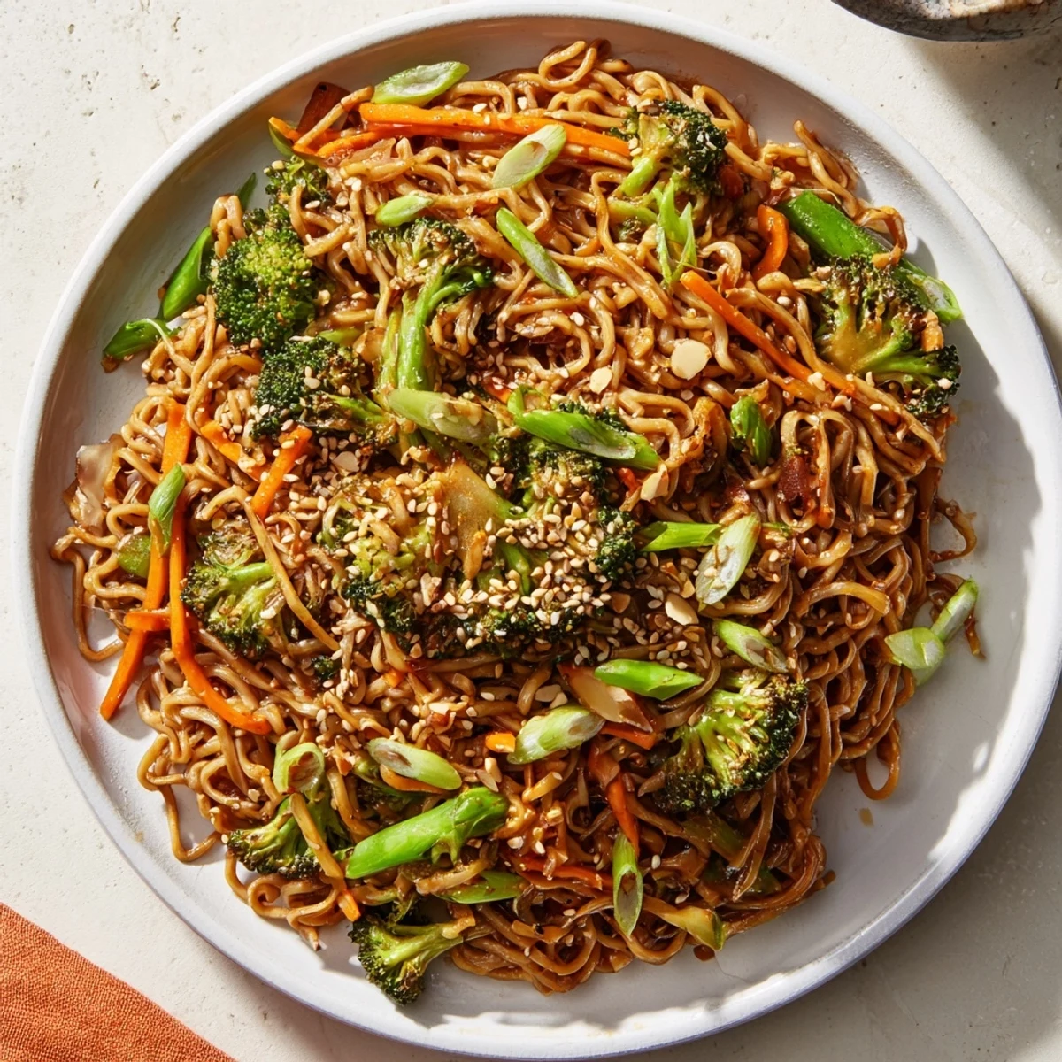 Sizzling Ramen Noodle Stir-Fry Remix: a close-up shows tender noodles and crisp vegetables, ready to serve and enjoy.