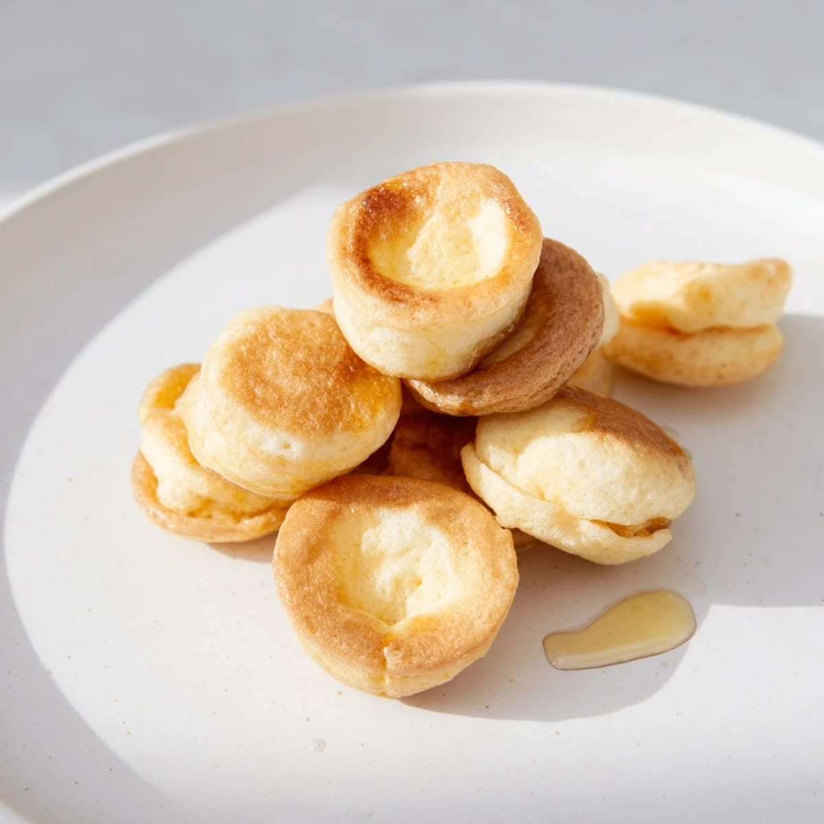 Bowl of American pancake cereal with fresh berries, offering a delightful bite-sized treat.