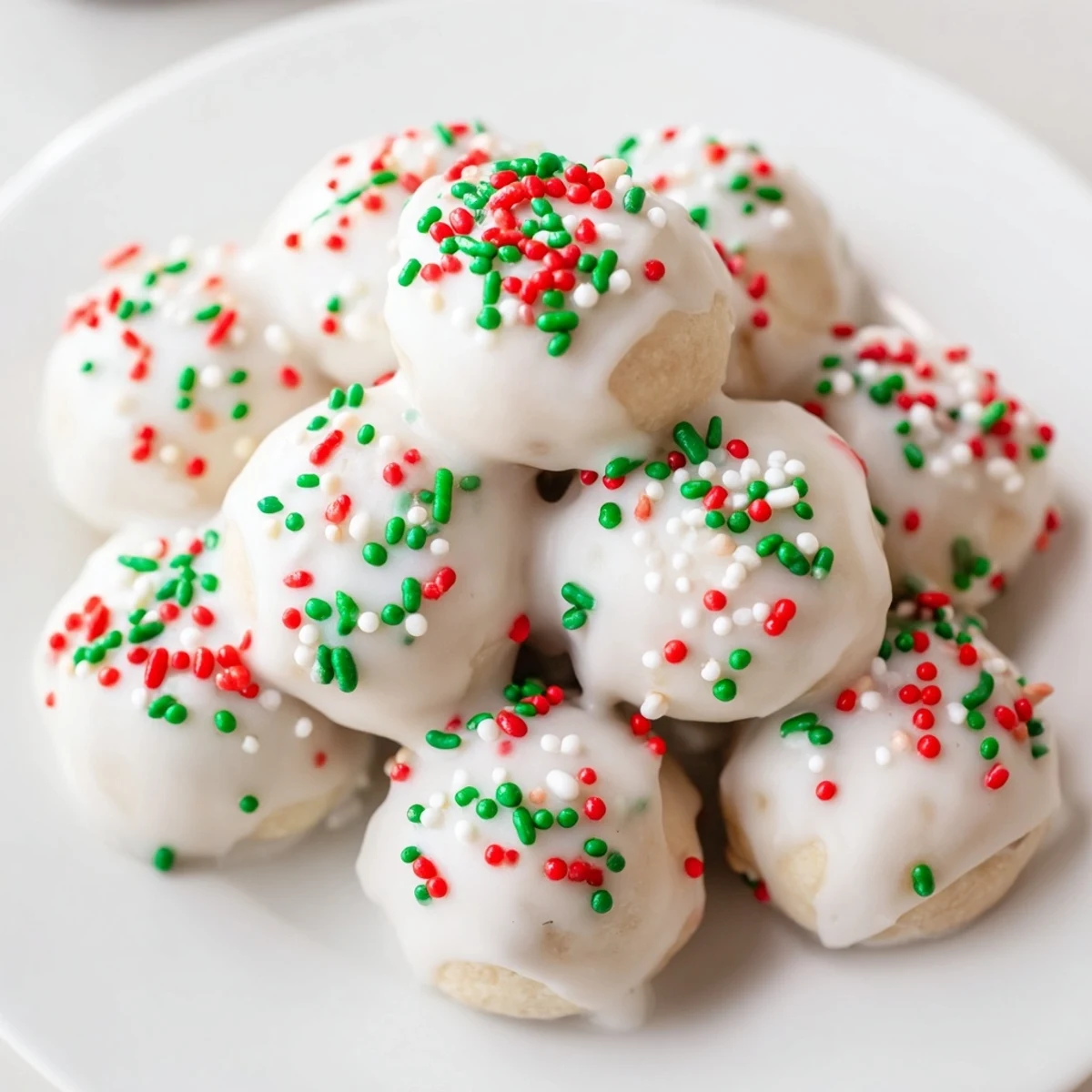 Golden-brown Protein-Packed Italian Christmas Cookie Balls ready to be glazed and enjoyed at Christmas.