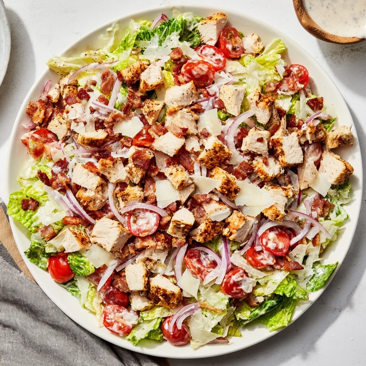 Costco Chicken Bake Salad Bowl: A delicious close-up of the flavorful salad with crispy bacon and juicy chicken.