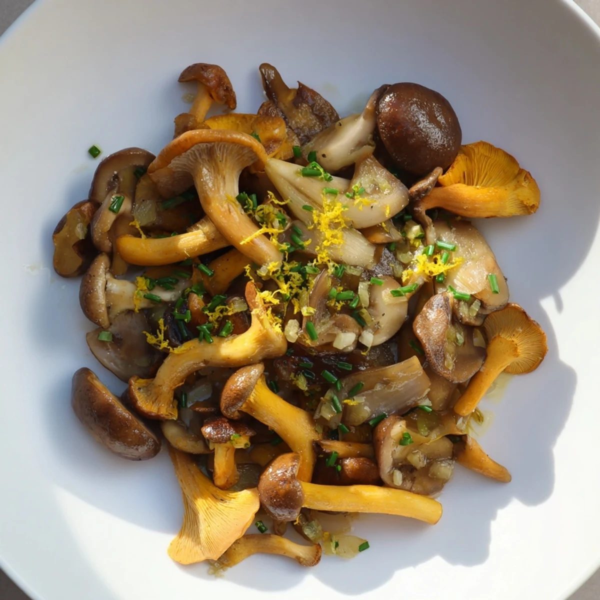 Golden-brown Enchanted Forest Mushrooms sizzling in a pan with herbs, promising a savory side dish.