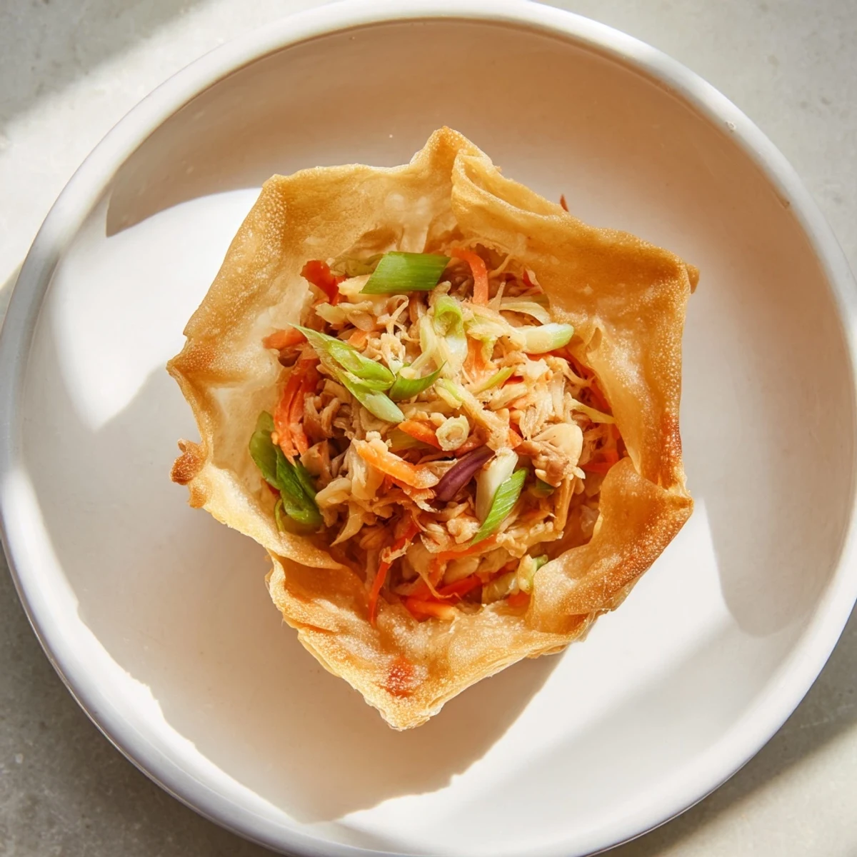 Golden, crispy rice paper dumplings with a vibrant veggie filling, ready to dip!