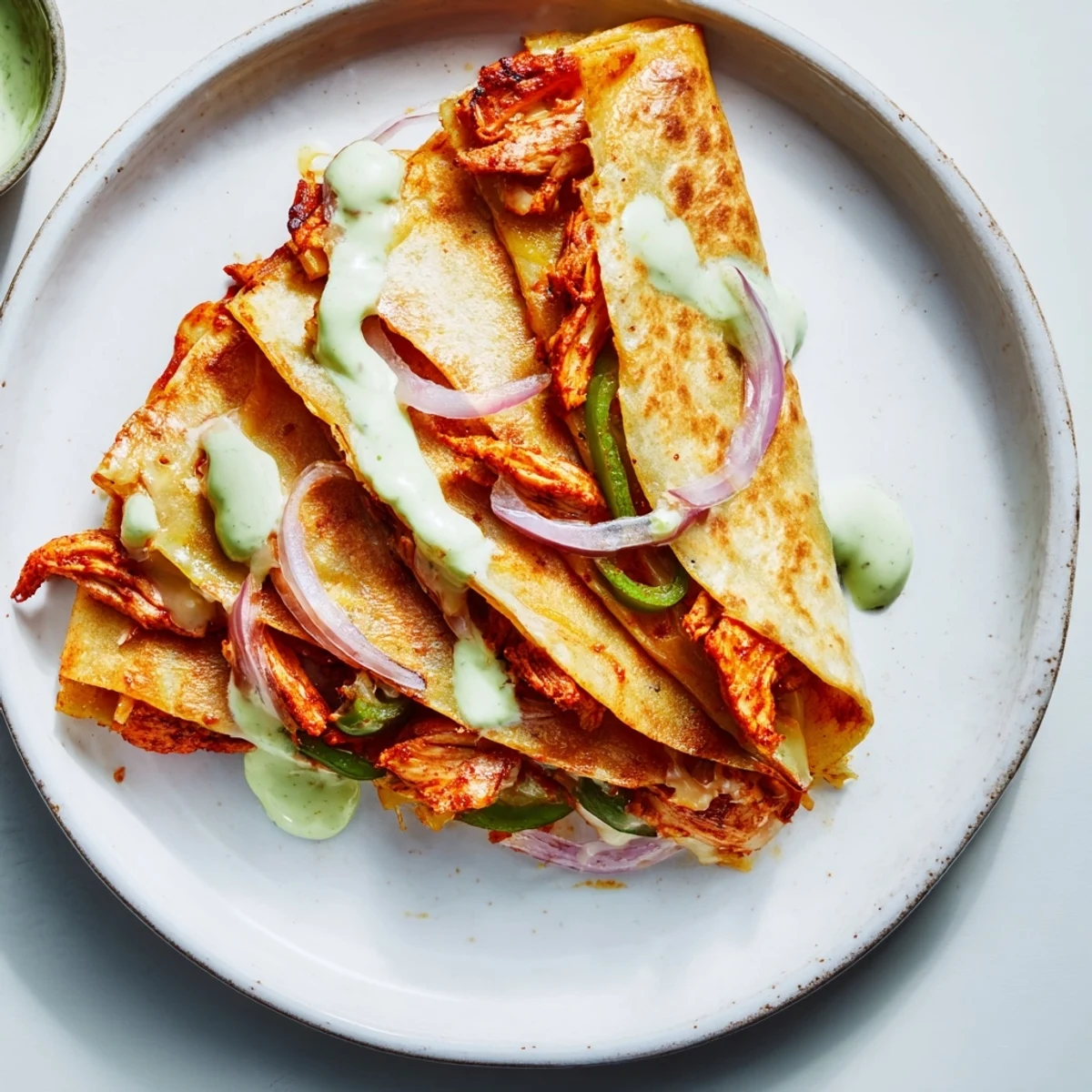 Juicy Tandoori Chicken Quesadilla featuring colorful bell peppers and melted cheese, perfect for dinner.