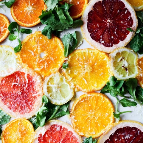 Winter Citrus & Candied Pecan Salad: A colorful mix of citrus, greens, goat cheese, and candied pecans.