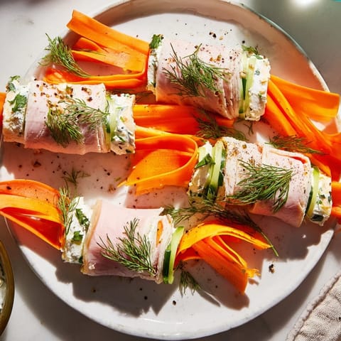 Delicate slices of turkey are wrapped in veggie ribbons, creating an elegant Ribbon Dancer dish.