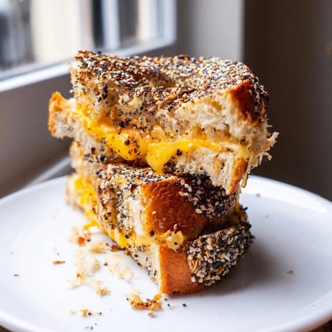 See the bubbling cheddar in this Everything Bagel Grilled Cheese, a delicious, easy, vegetarian lunch.