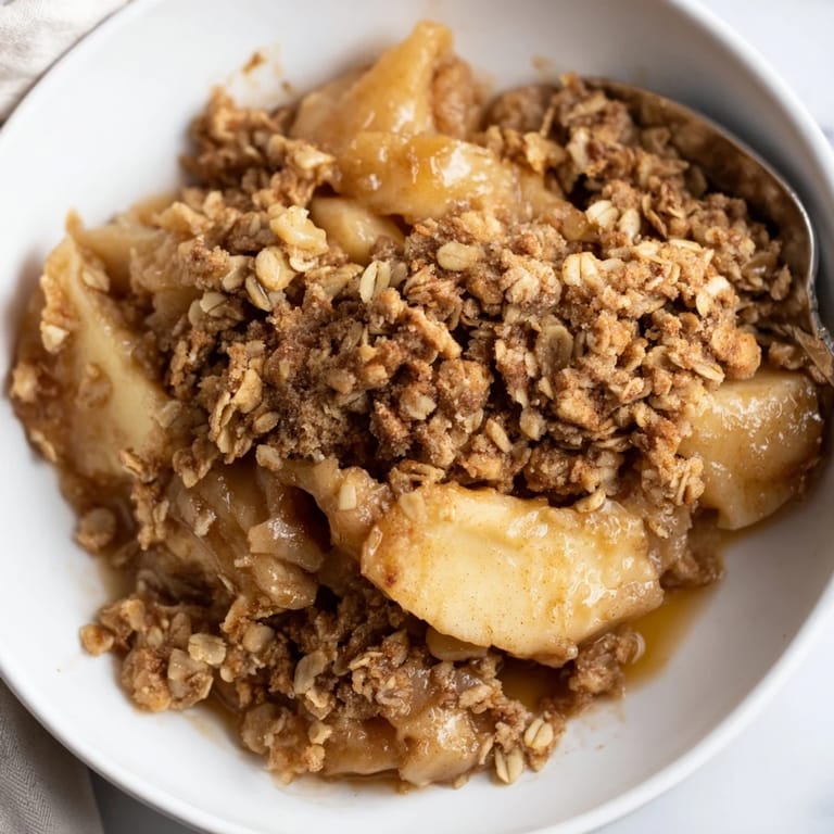Satisfy your cravings with this Warm Apple Crisp, rich in cinnamon and textures.  