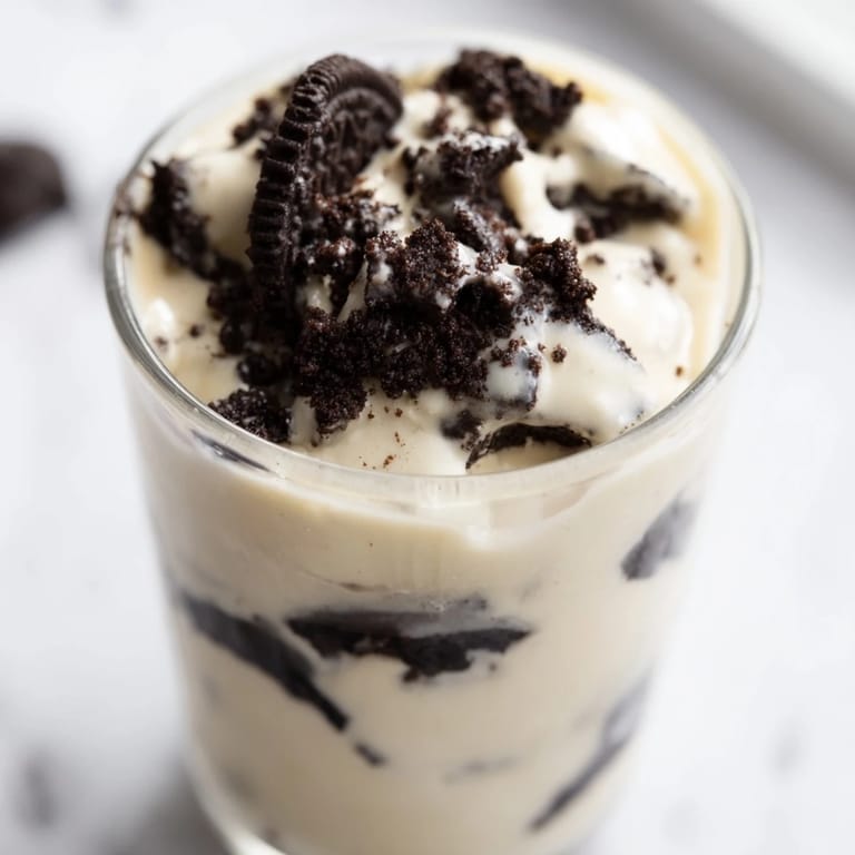 This photo displays a ready-to-eat Vanilla Pudding with crushed Oreos, a simple, delicious dessert.