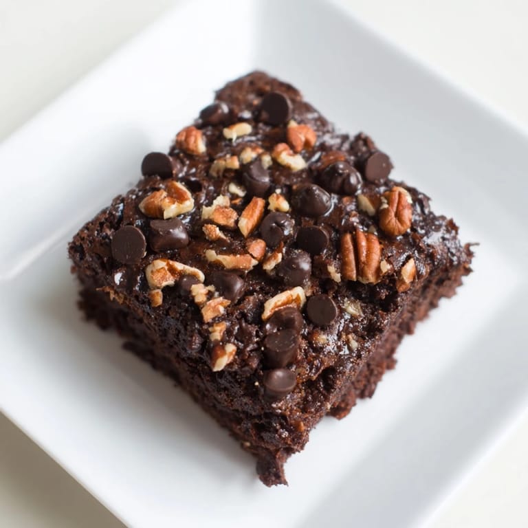 Freshly baked Greek yogurt brownies, a healthy dessert option, ready to be enjoyed.